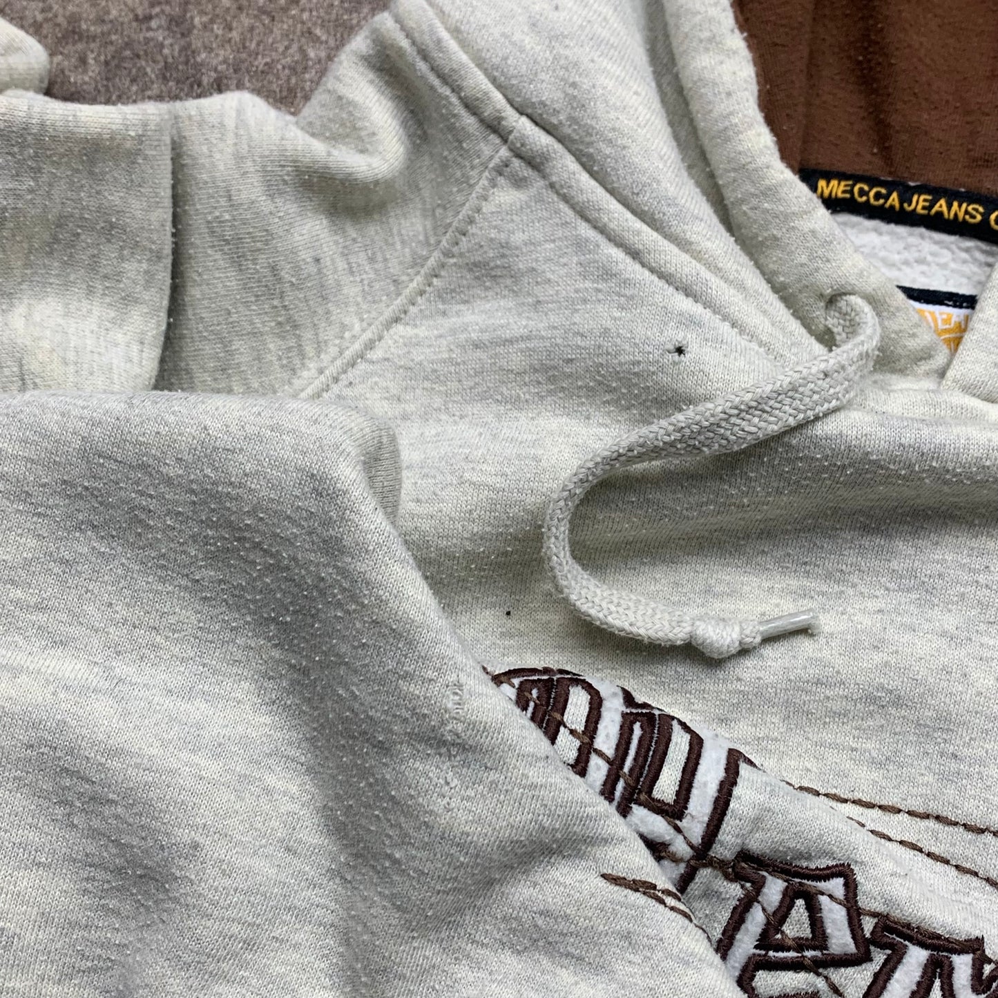 Mecca 00s graphic baggy light grey hoodie
