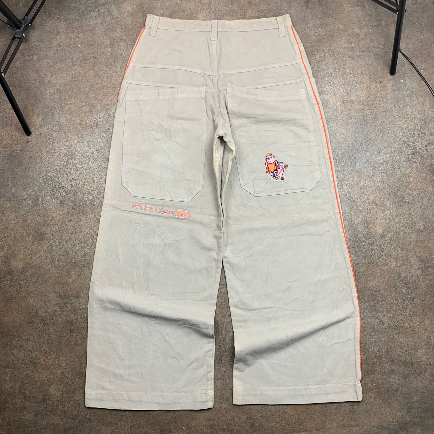 Exercise Surfwear 90s cream baggy graphic jeans