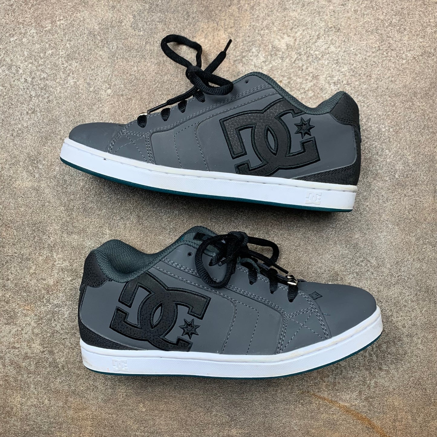 DC Shoes grey grunge studded trainers