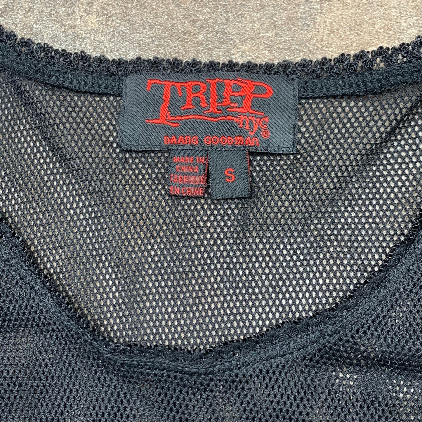 Tripp NYC 00s fishnet long sleeve crop top