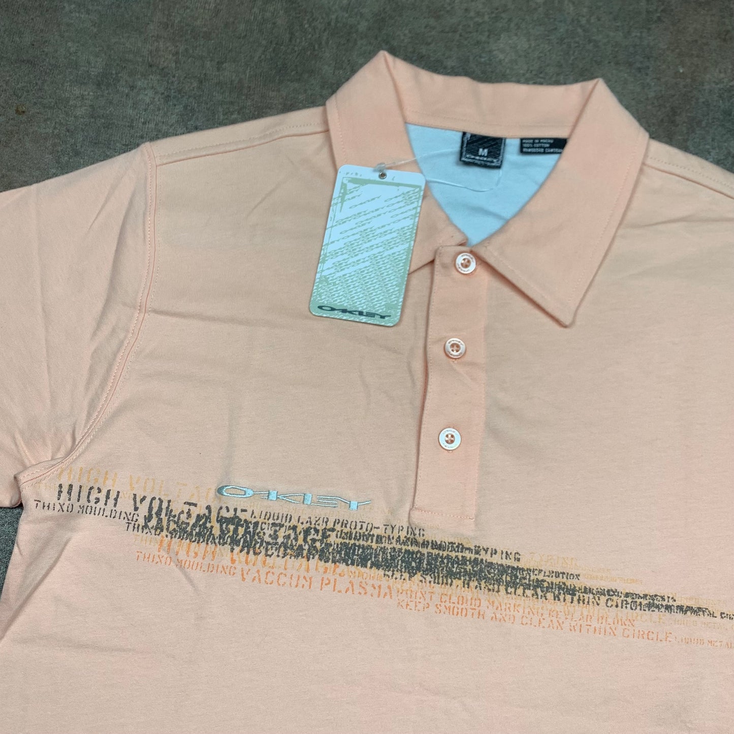 Oakley 00s pink graphic polo shirt