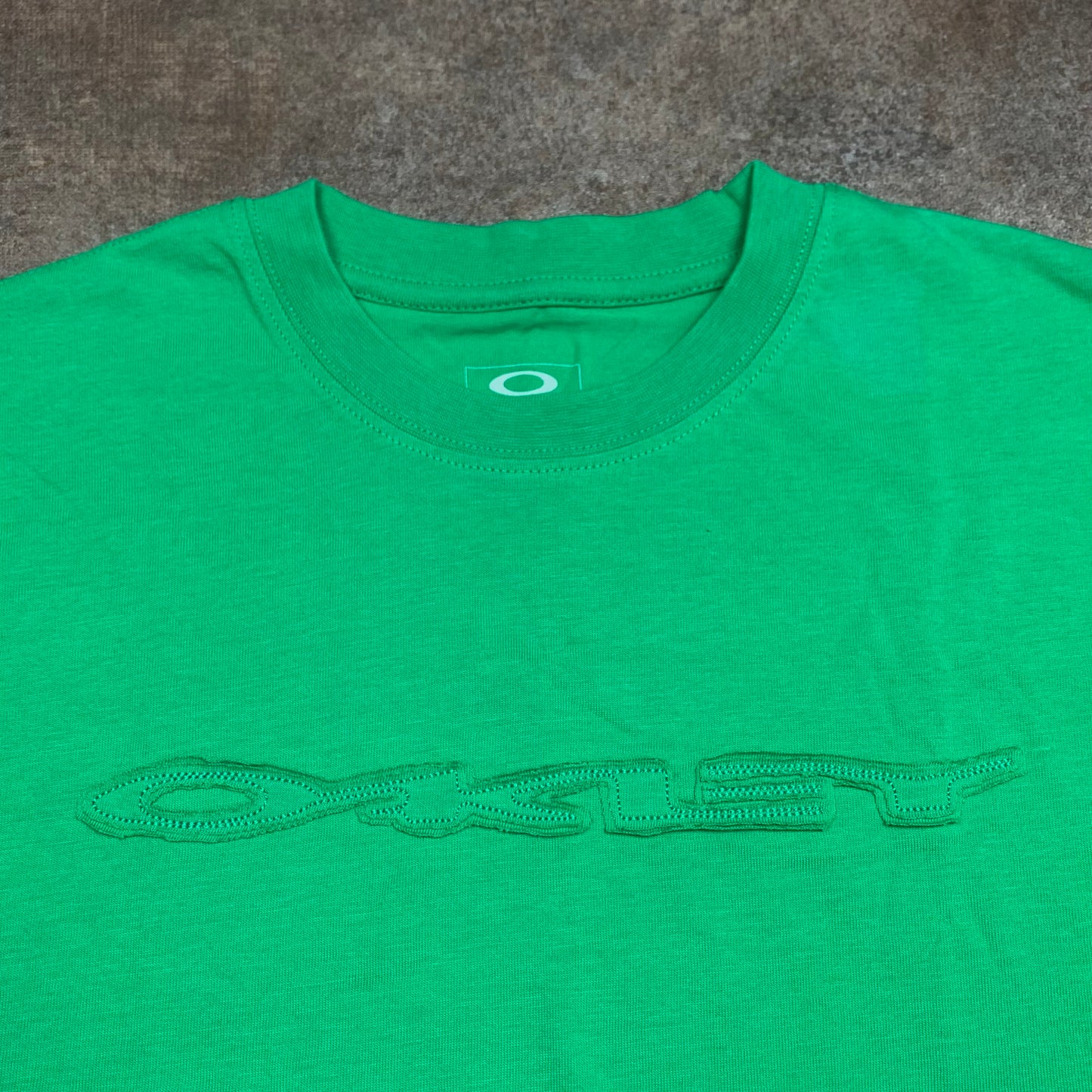 Oakley 00s green cut and sew graphic tee