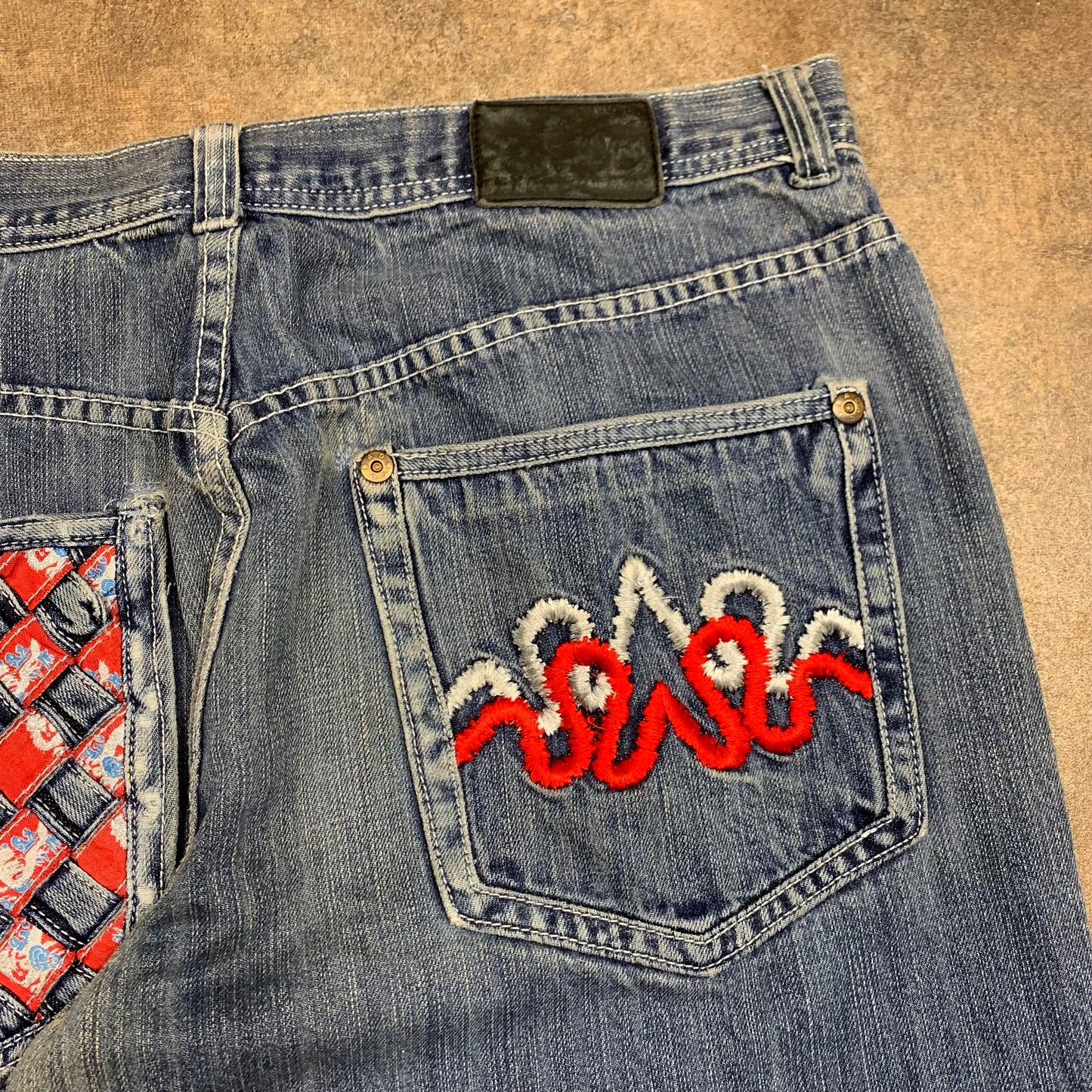 Raw Blue 00s blue baggy graphic denim jeans