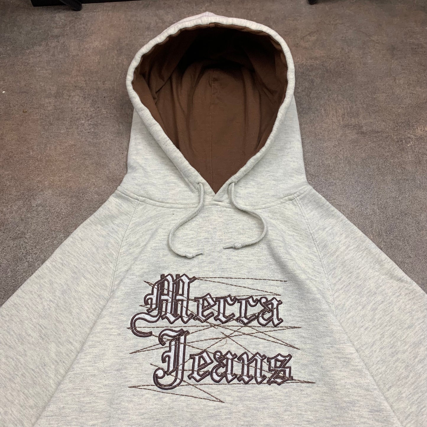 Mecca 00s graphic baggy light grey hoodie