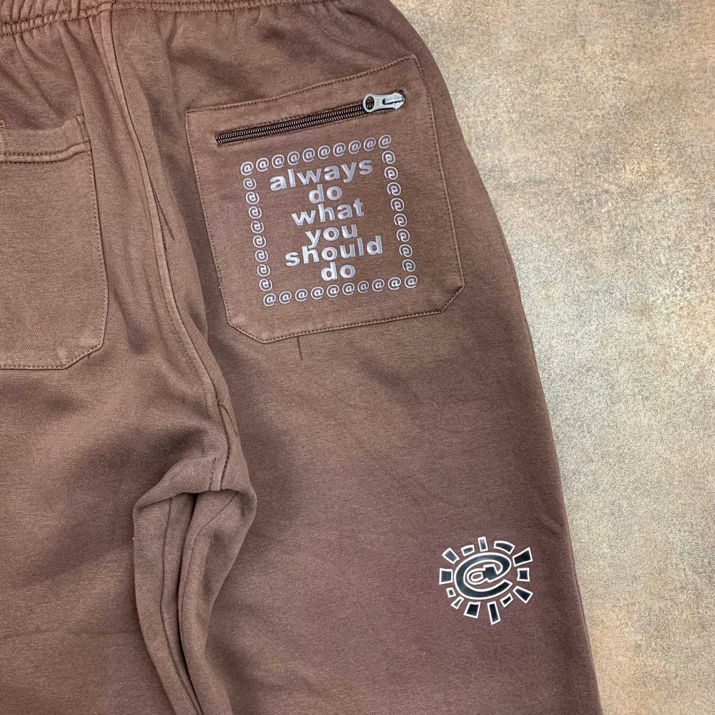 Always Do What You Should Do baggy graphic joggers