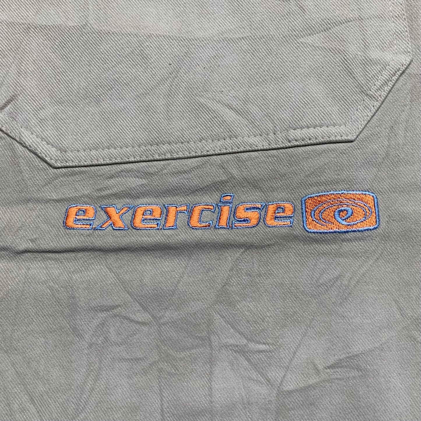 Exercise Surfwear 90s cream baggy graphic jeans