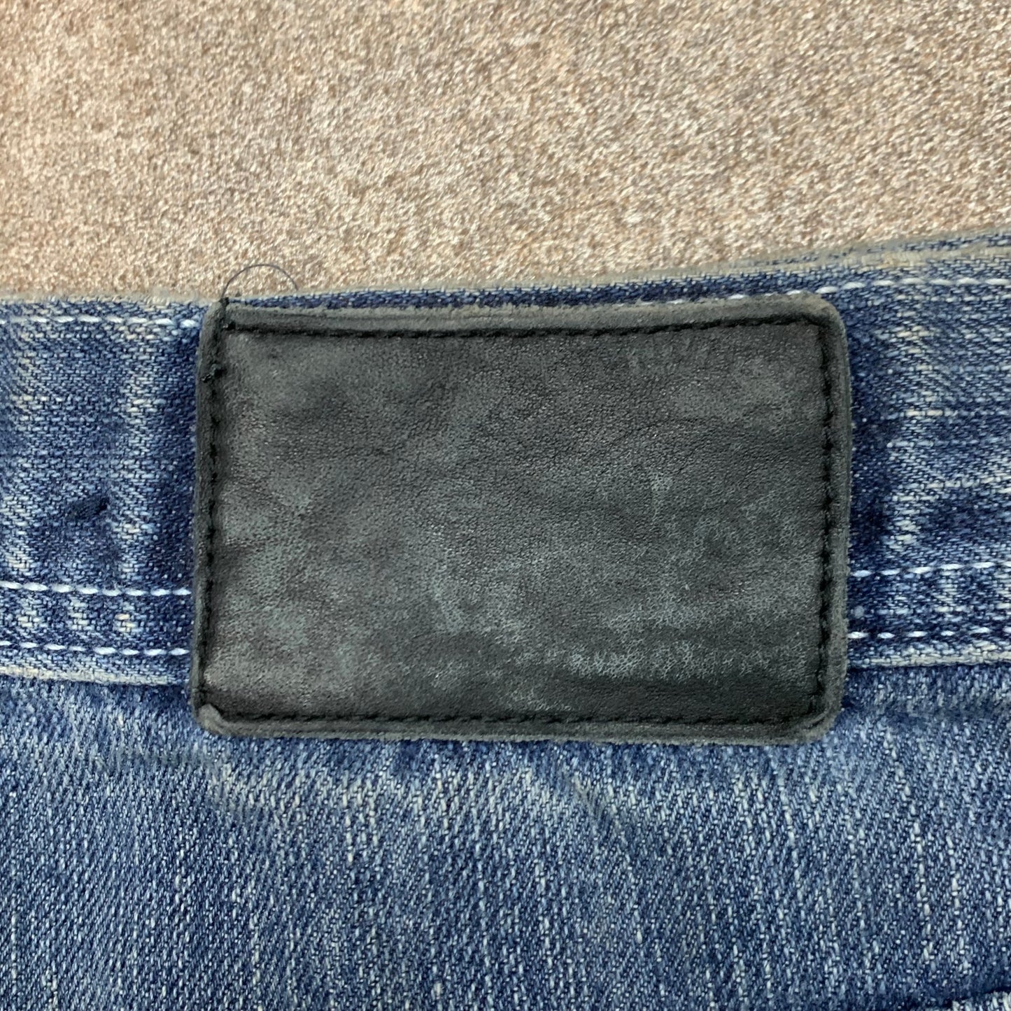 Raw Blue 00s blue baggy graphic denim jeans