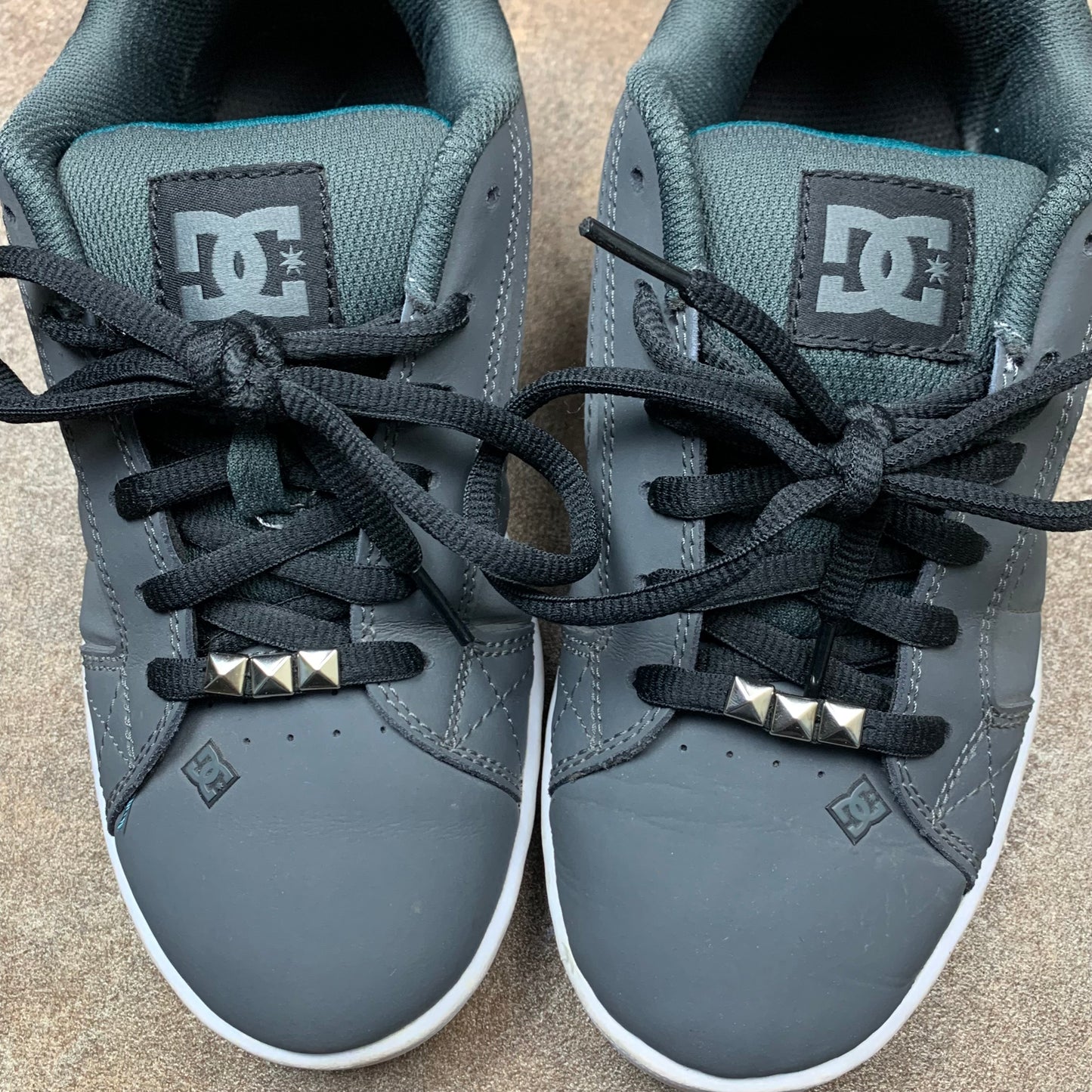 DC Shoes grey grunge studded trainers