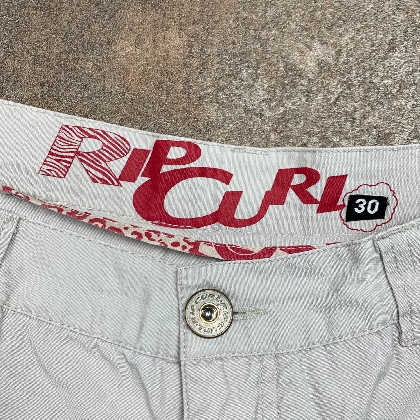 Rip Curl 00s cream graphic baggy cargo jorts