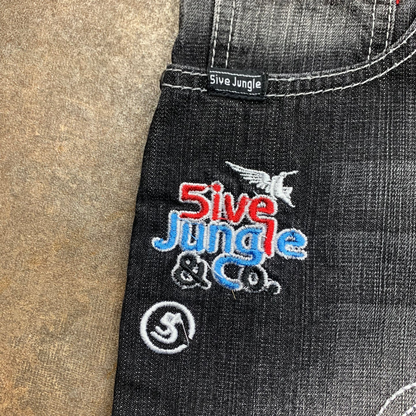 5ive Jungle and Co. baggy embroidered graphic jeans