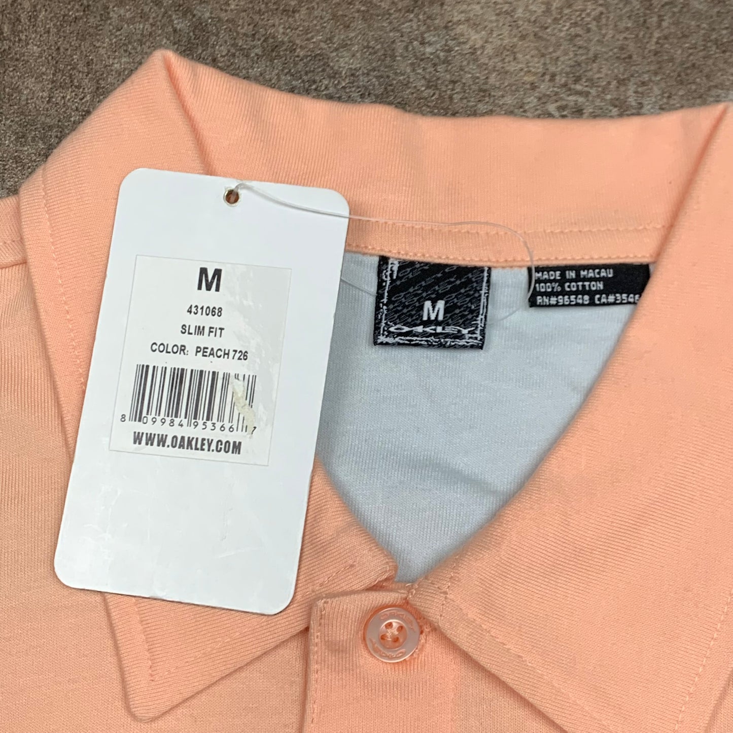 Oakley 00s pink graphic polo shirt