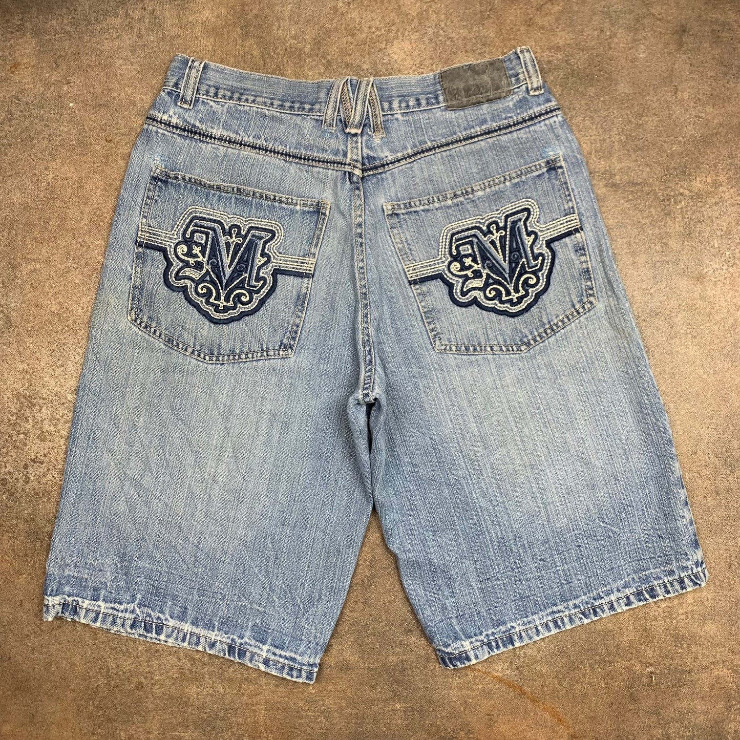 Mecca 00s light blue baggy graphic jorts