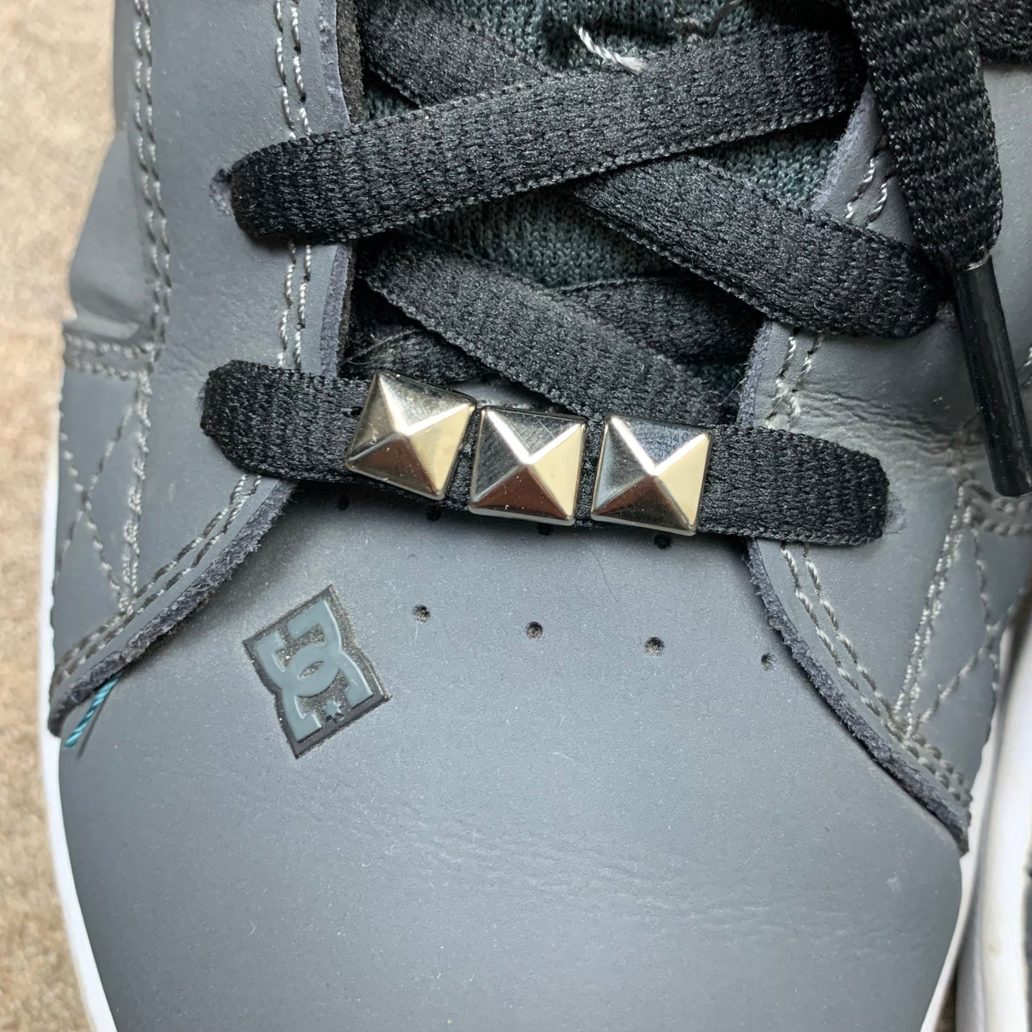 DC Shoes grey grunge studded trainers