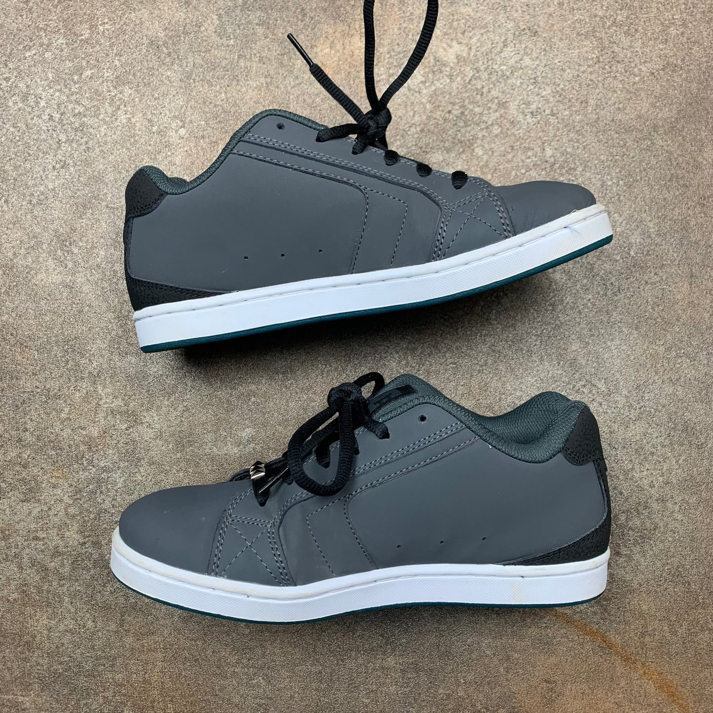 DC Shoes grey grunge studded trainers