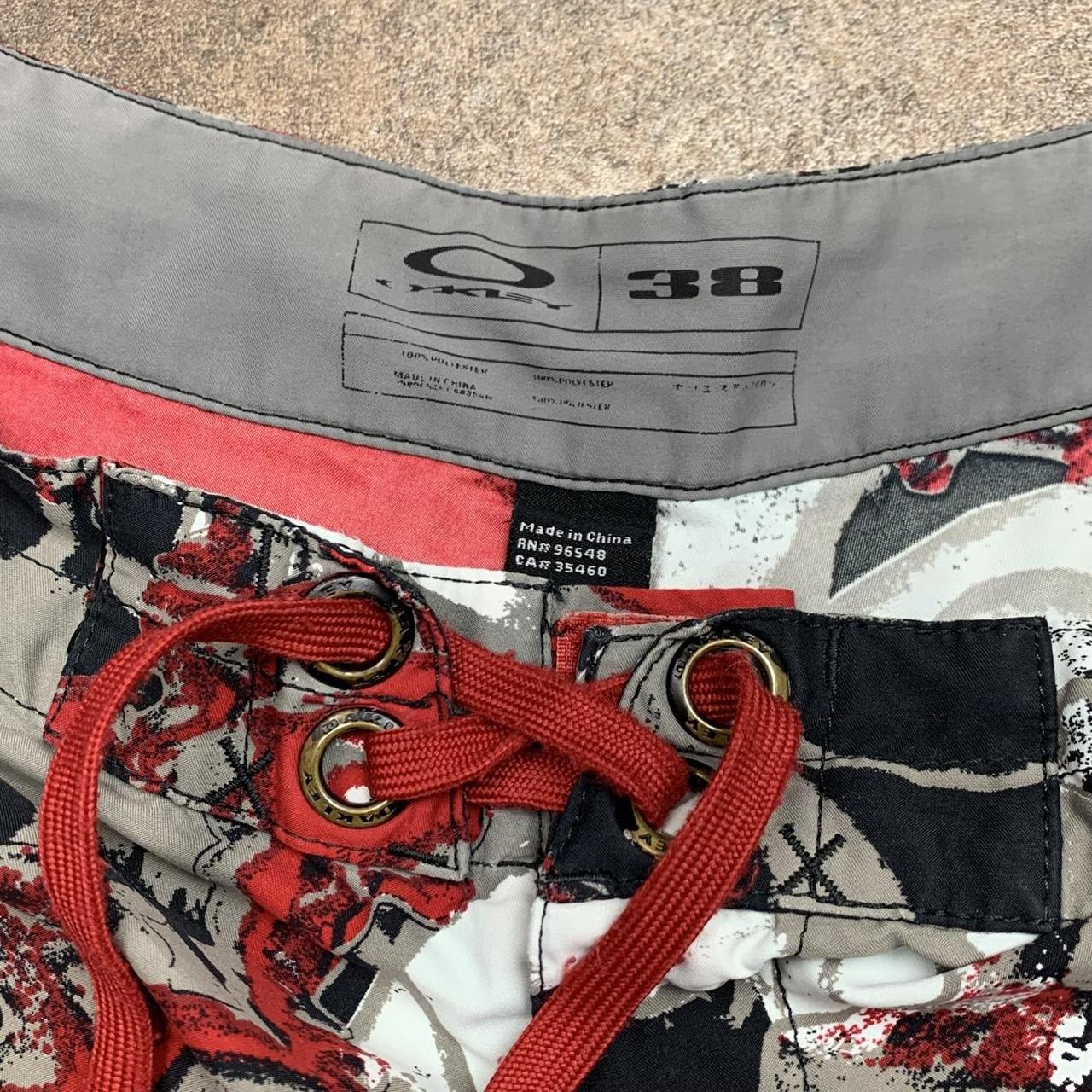 Oakley 00s black red grey graphic baggy boardshorts