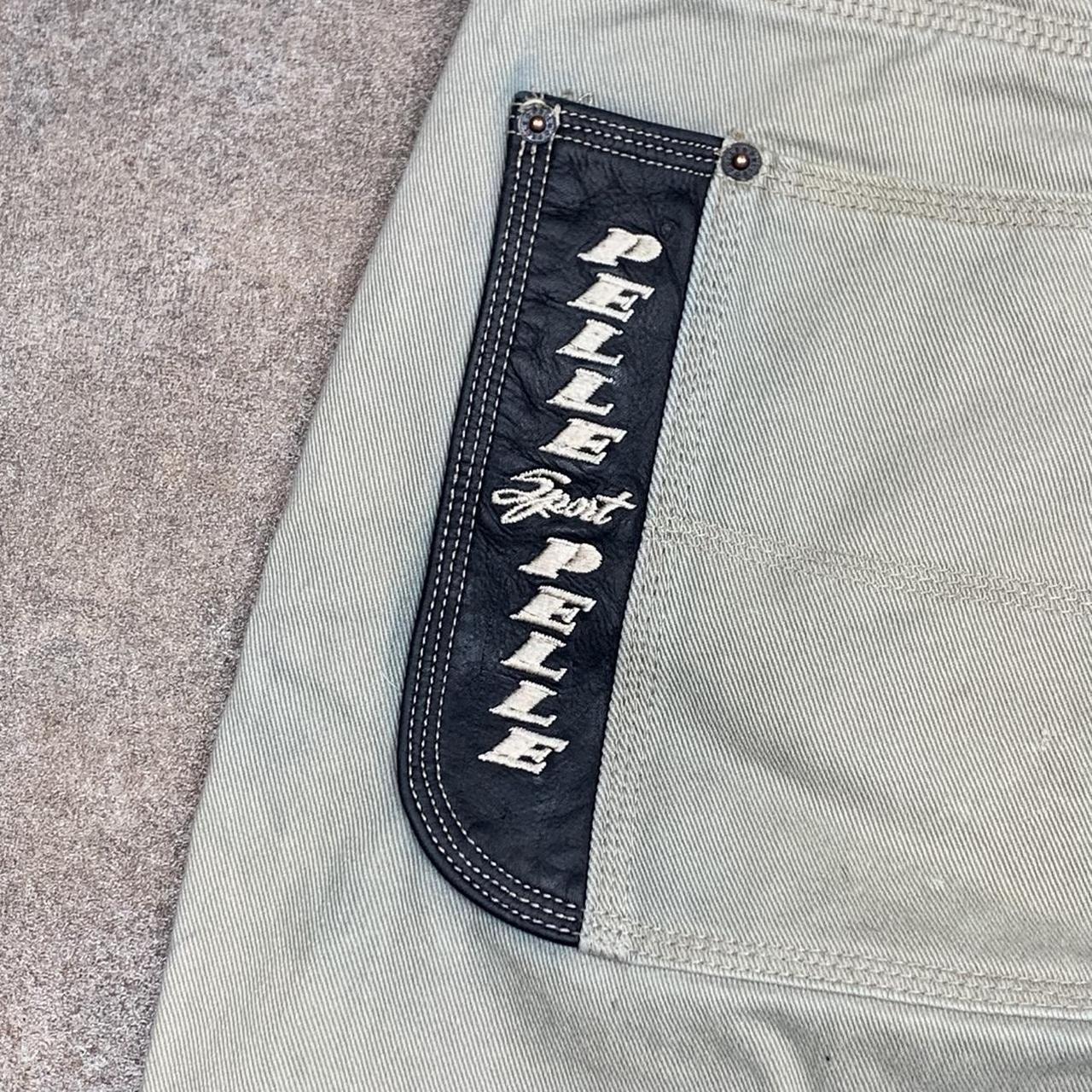 Pelle Pelle Marc Buchanan 90s graphic baggy cream denim jeans