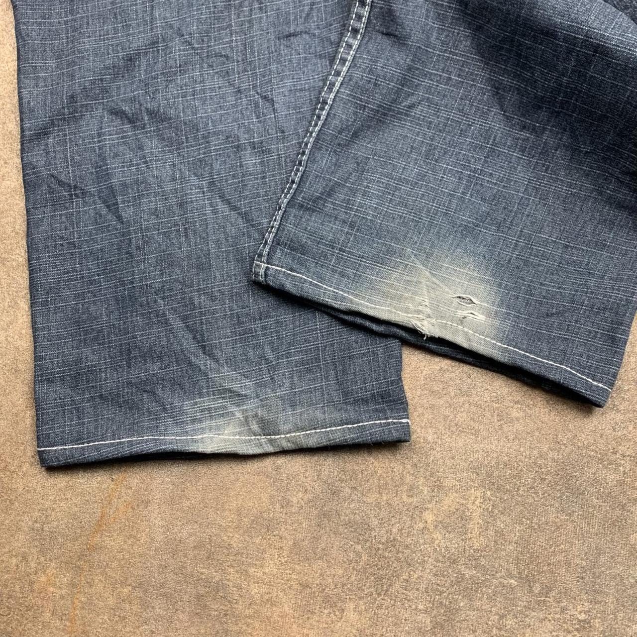 Brooklyn Xpress 90s embroidered navy blue faded denim jeans