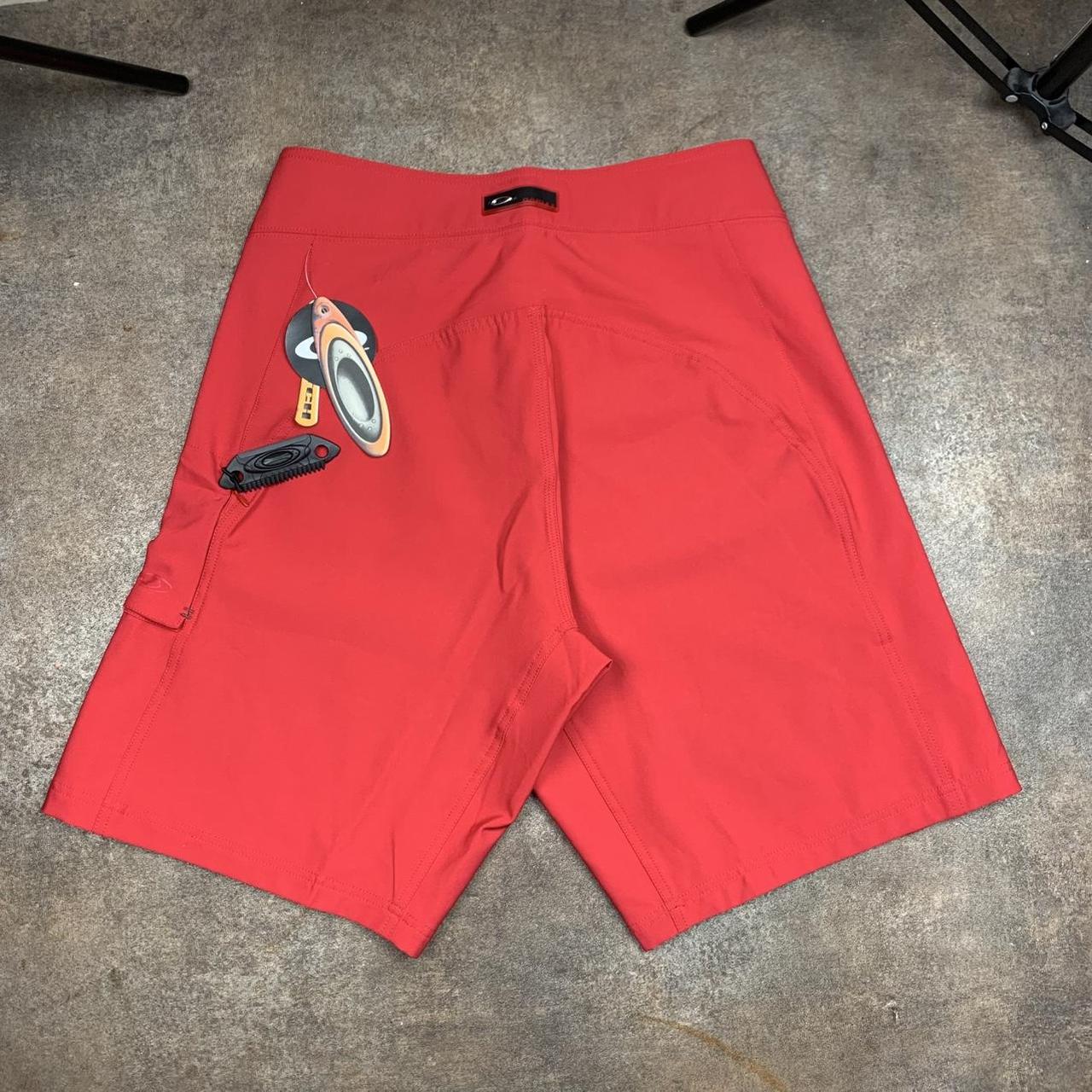 Oakley Software 00s red graphic baggy boardshorts