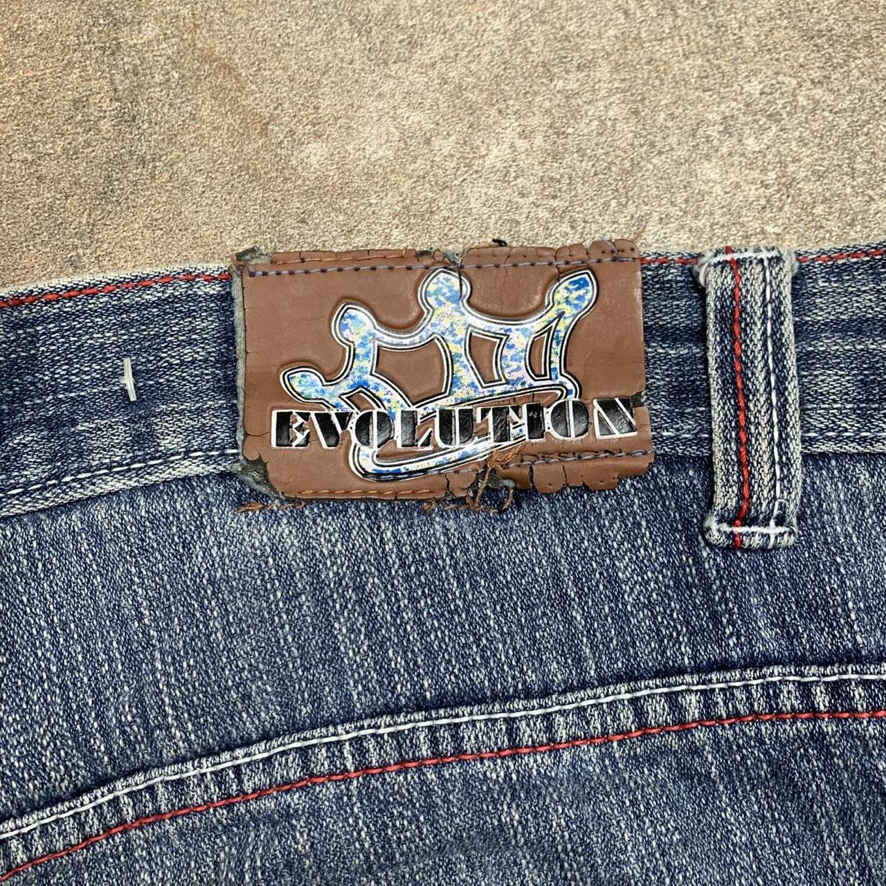 Evolution 00s baggy blue graphic jorts