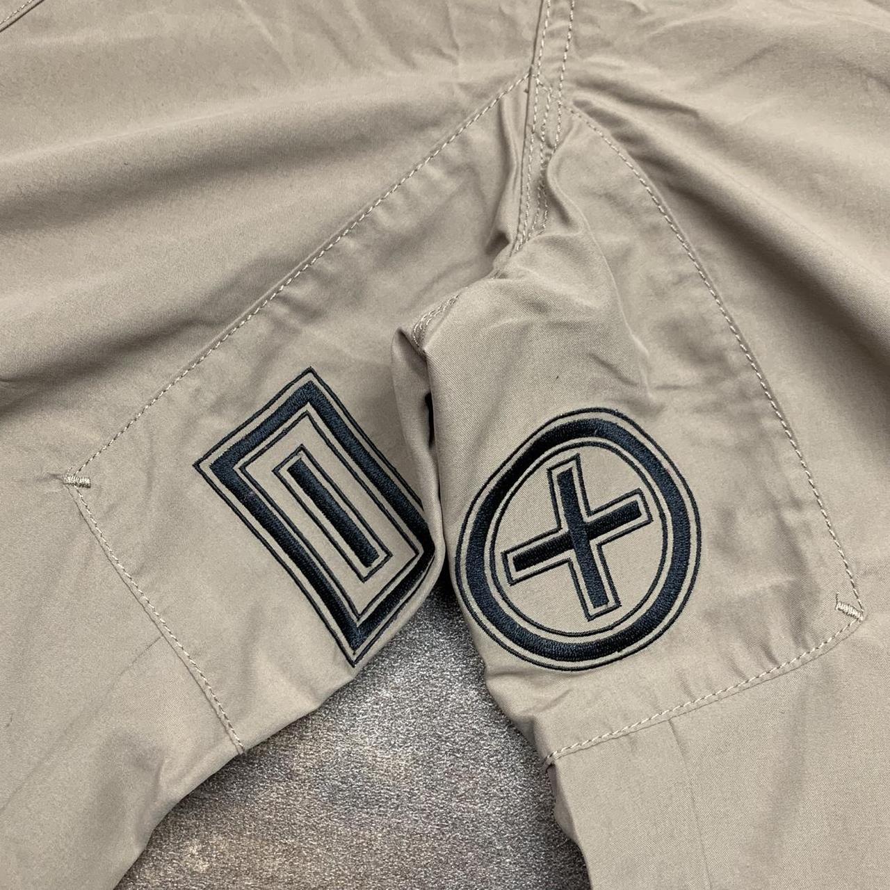 PLUSMINUS 00s beige graphic baggy studded cargo shorts