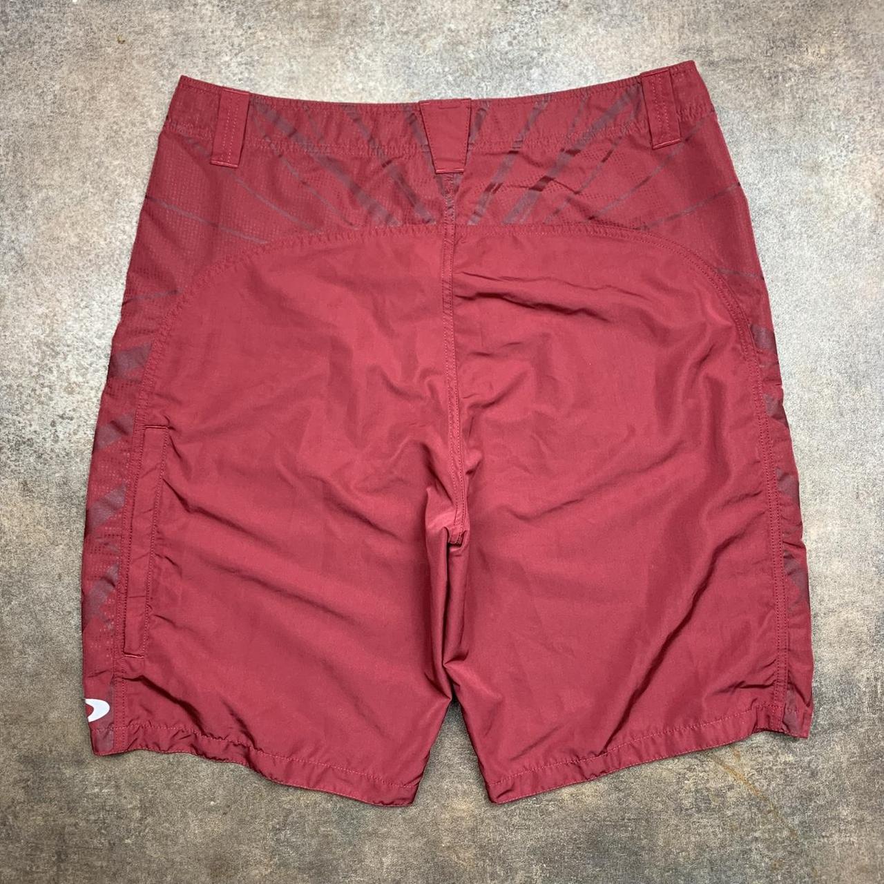 Oakley Software 00s graphic red baggy cargo shorts