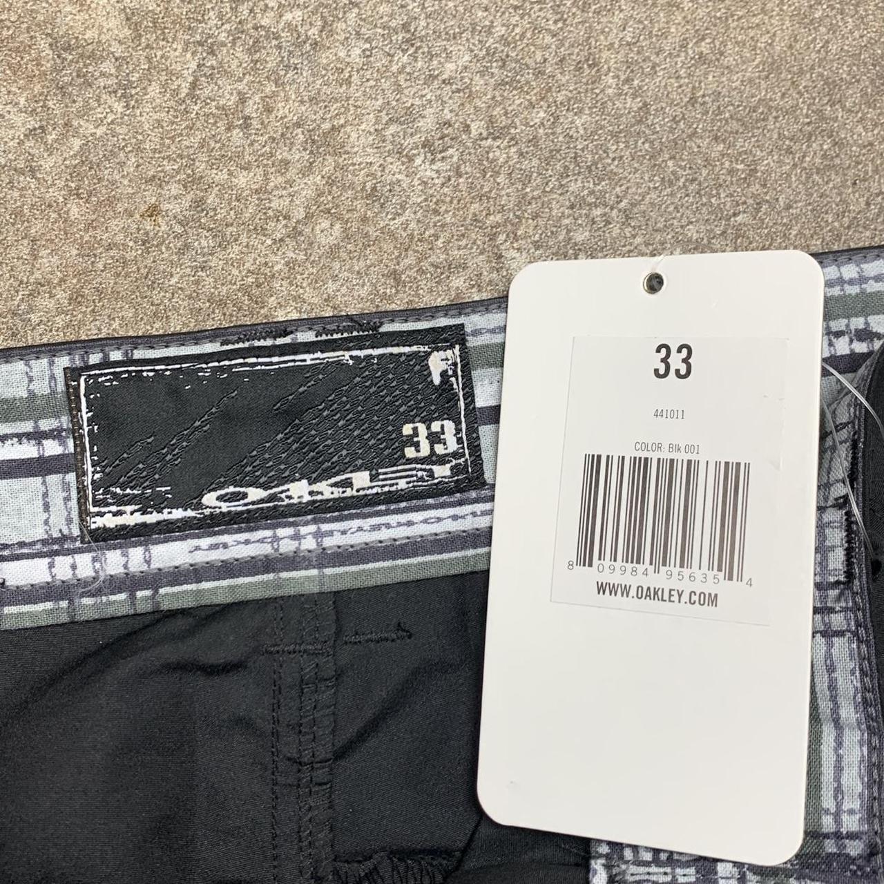 Oakley 00s black baggy graphic cargo shorts