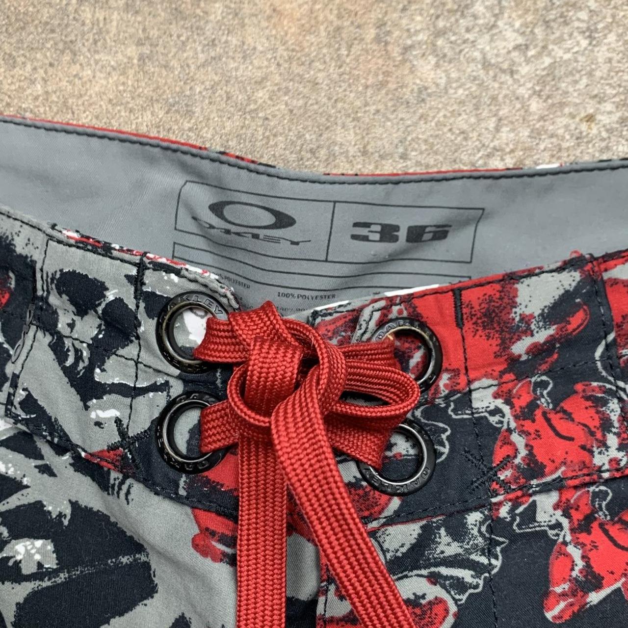 Oakley 00s black grey red graphic baggy boardshorts