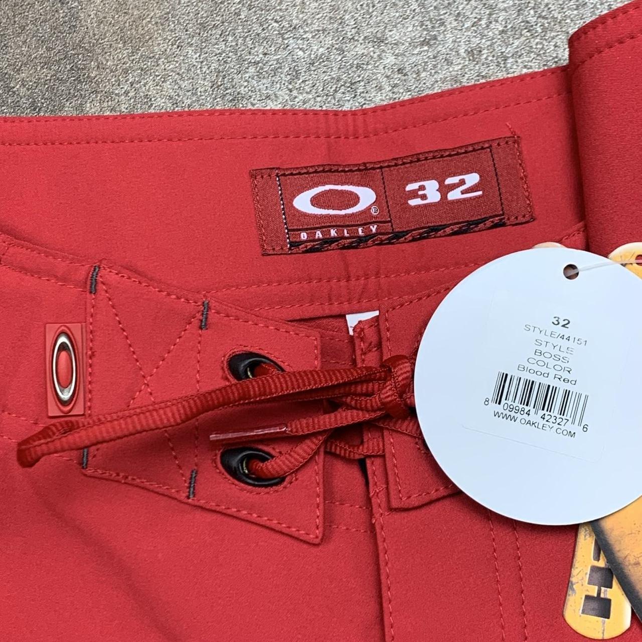 Oakley Software 00s red graphic baggy boardshorts