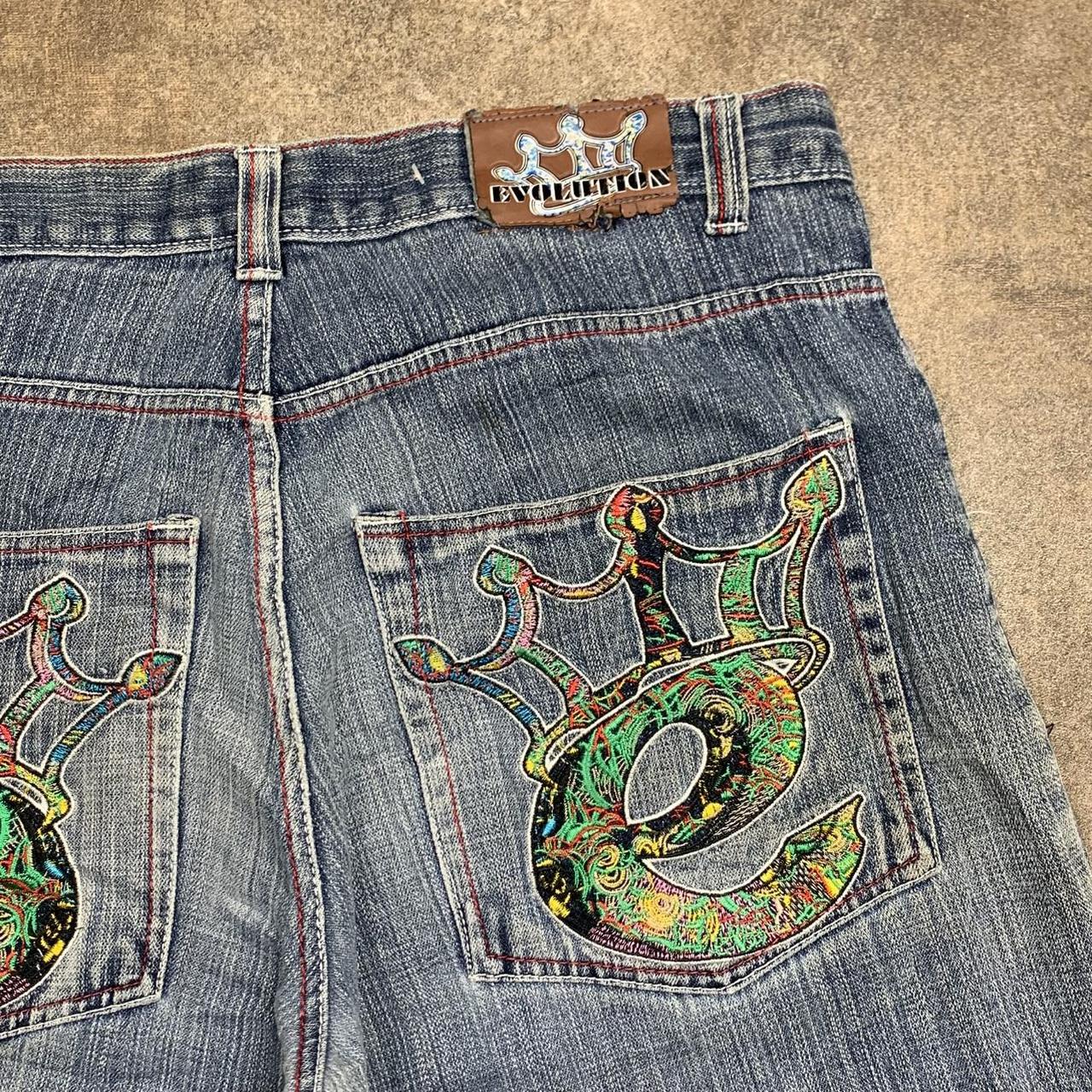 Evolution 00s baggy blue graphic jorts