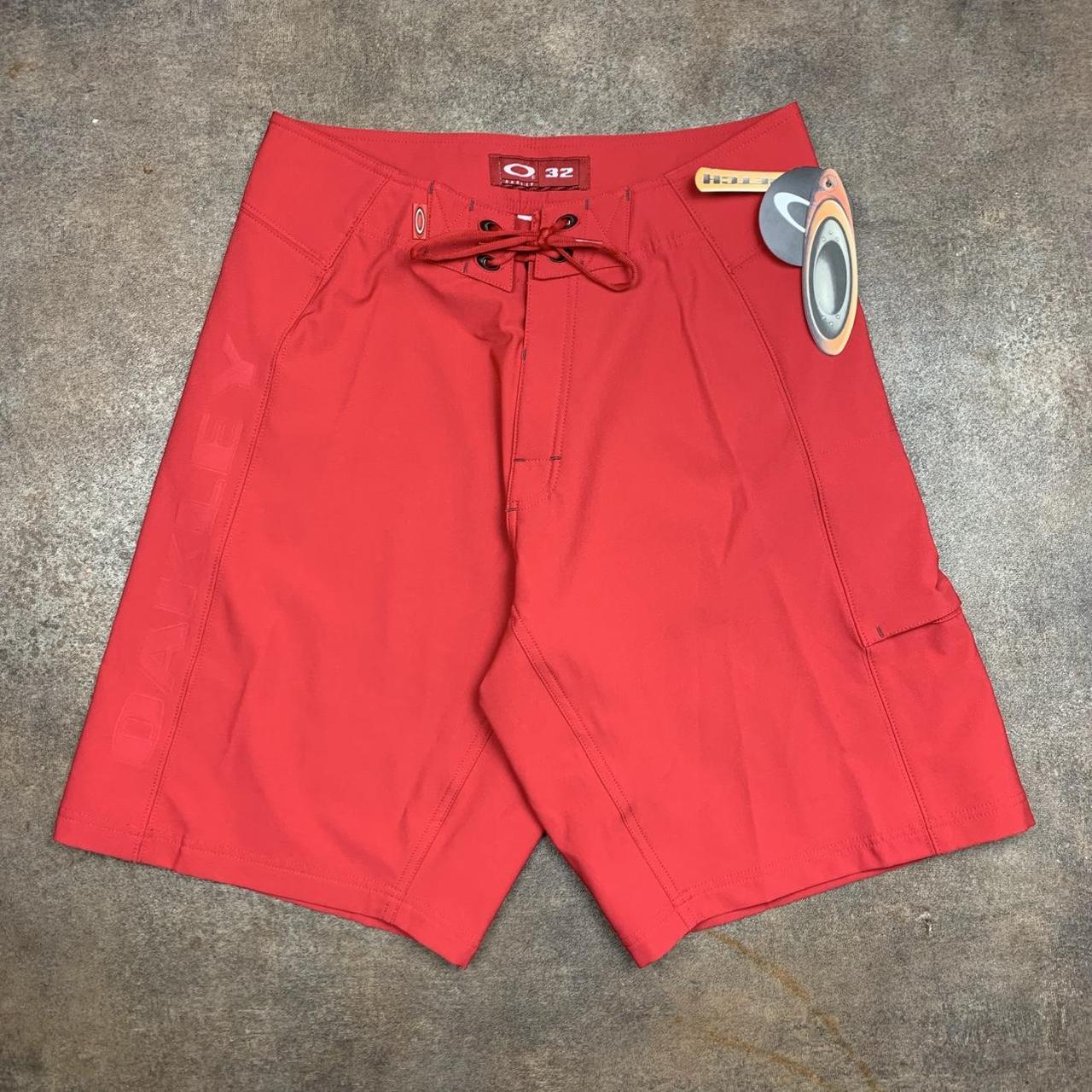 Oakley Software 00s red graphic baggy boardshorts