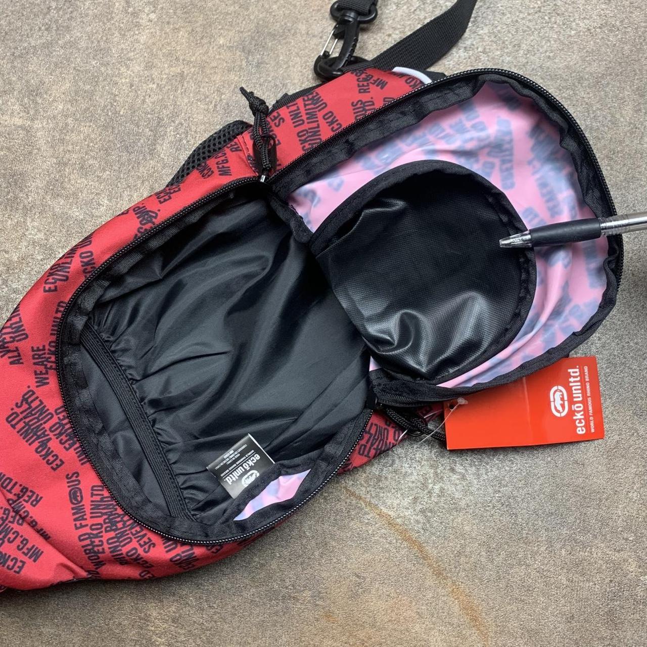 Ecko Unltd. black red graphic sling bag