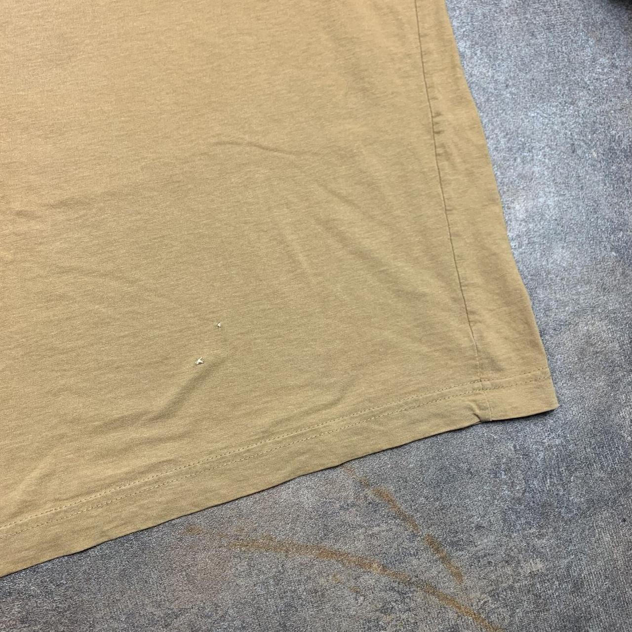 Oakley Elite 00s mustard yellow graphic tee