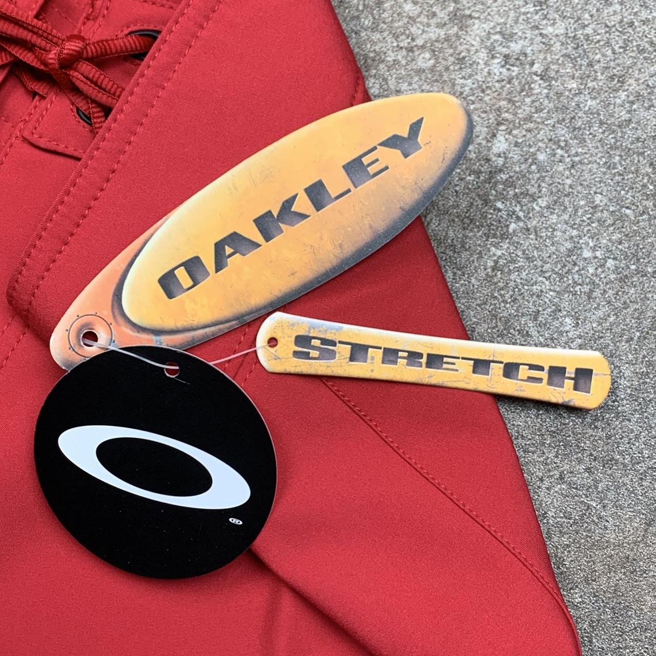 Oakley Software 00s red graphic baggy boardshorts