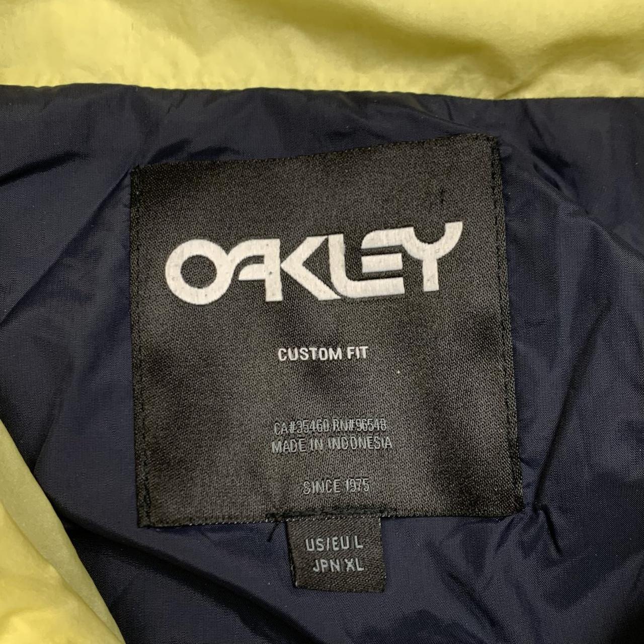 Oakley utilised black yellow graphic lightweight jacket