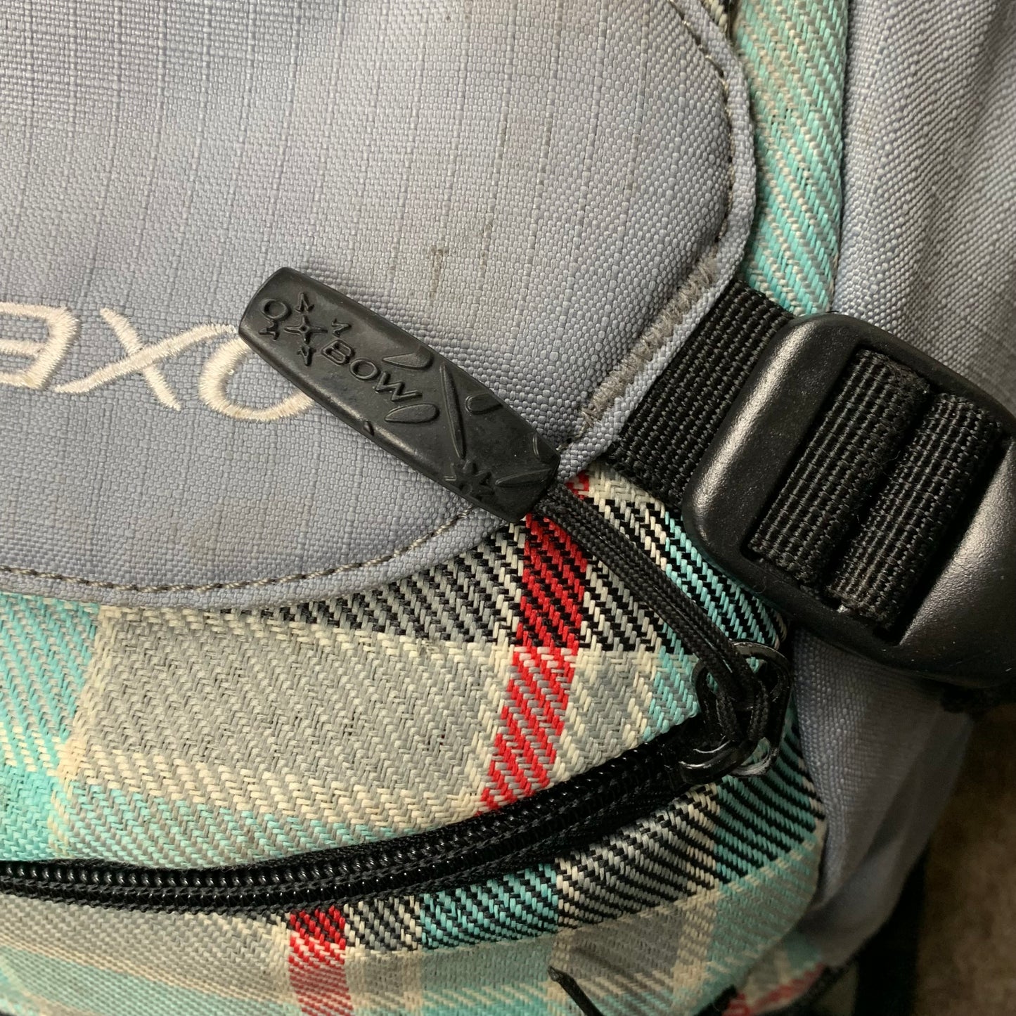 Oxbow 00s utilised plaid backpack