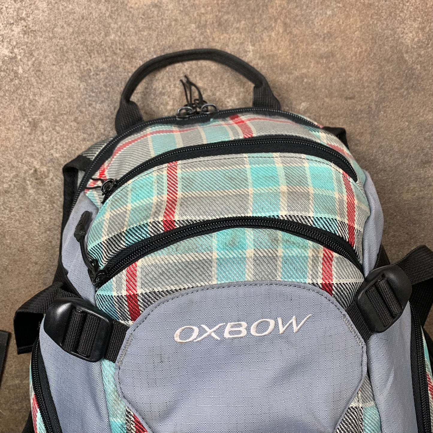 Oxbow 00s utilised plaid backpack