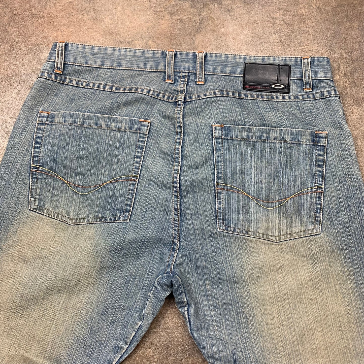 Oakley Software 00s flared faded jeans (38")