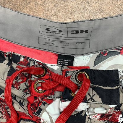 Oakley 00s black red grey graphic baggy boardshorts