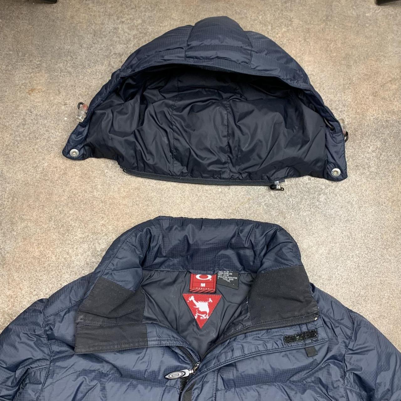 Oakley Software 00s navy puffer utilised ski jacket