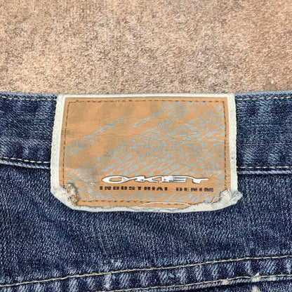 Oakley 00s baggy navy blue graphic denim jeans