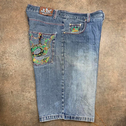 Evolution 00s baggy blue graphic jorts