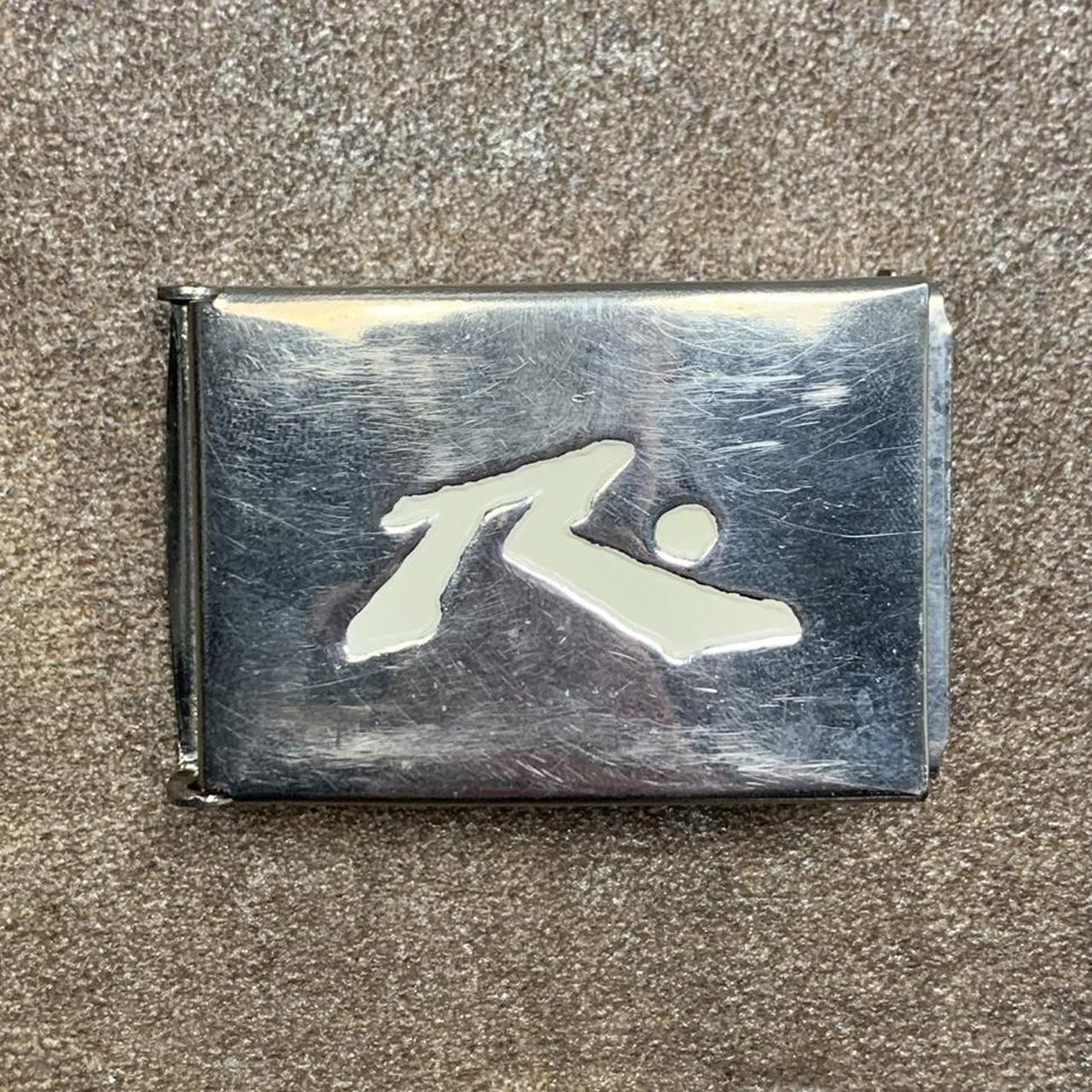 Rusty 00s graphic belt buckle