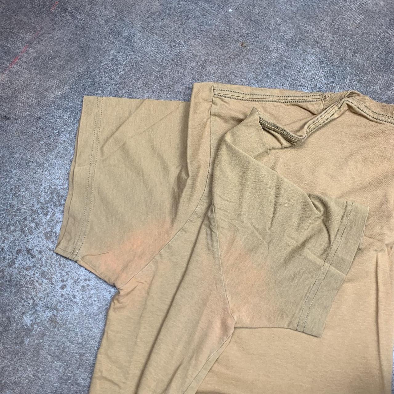 Oakley Elite 00s mustard yellow graphic tee