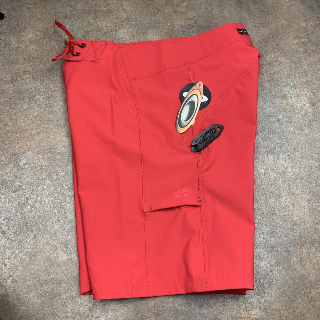 Oakley Software 00s red graphic baggy boardshorts