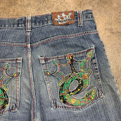 Evolution 00s baggy blue graphic jorts