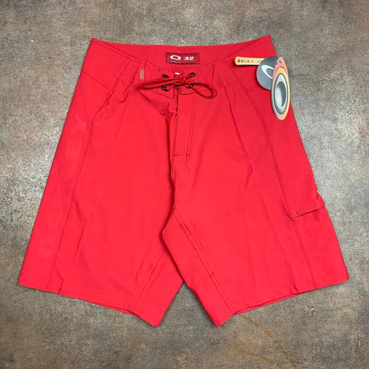 Oakley Software 00s red graphic baggy boardshorts