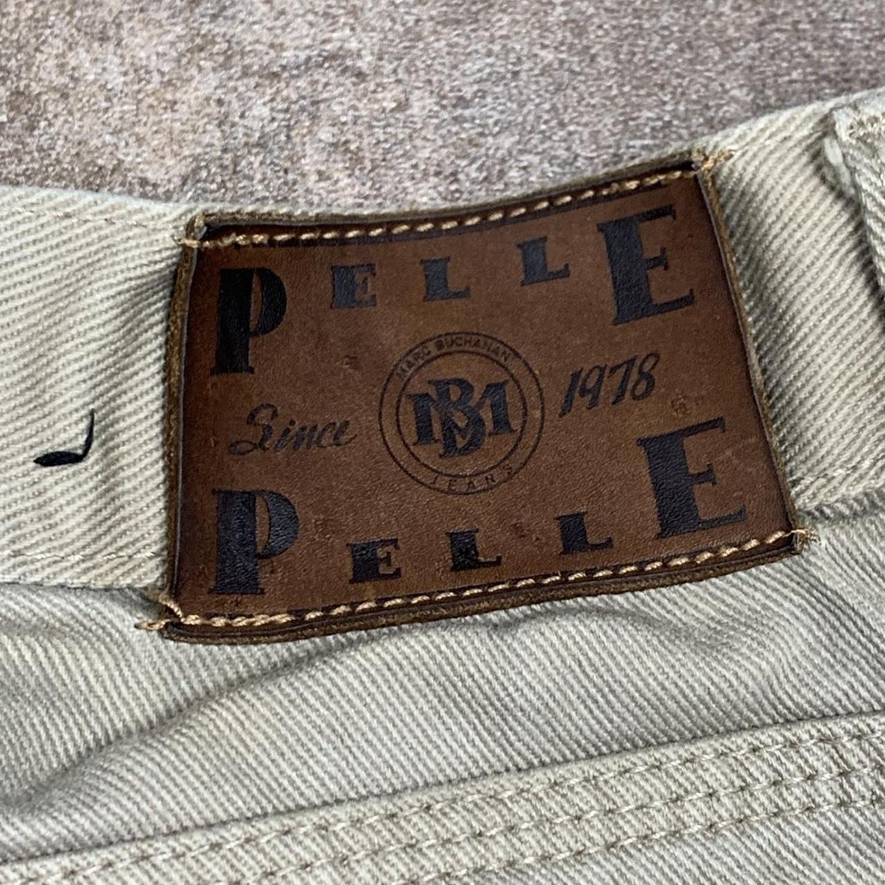 Pelle Pelle Marc Buchanan 90s graphic baggy cream denim jeans